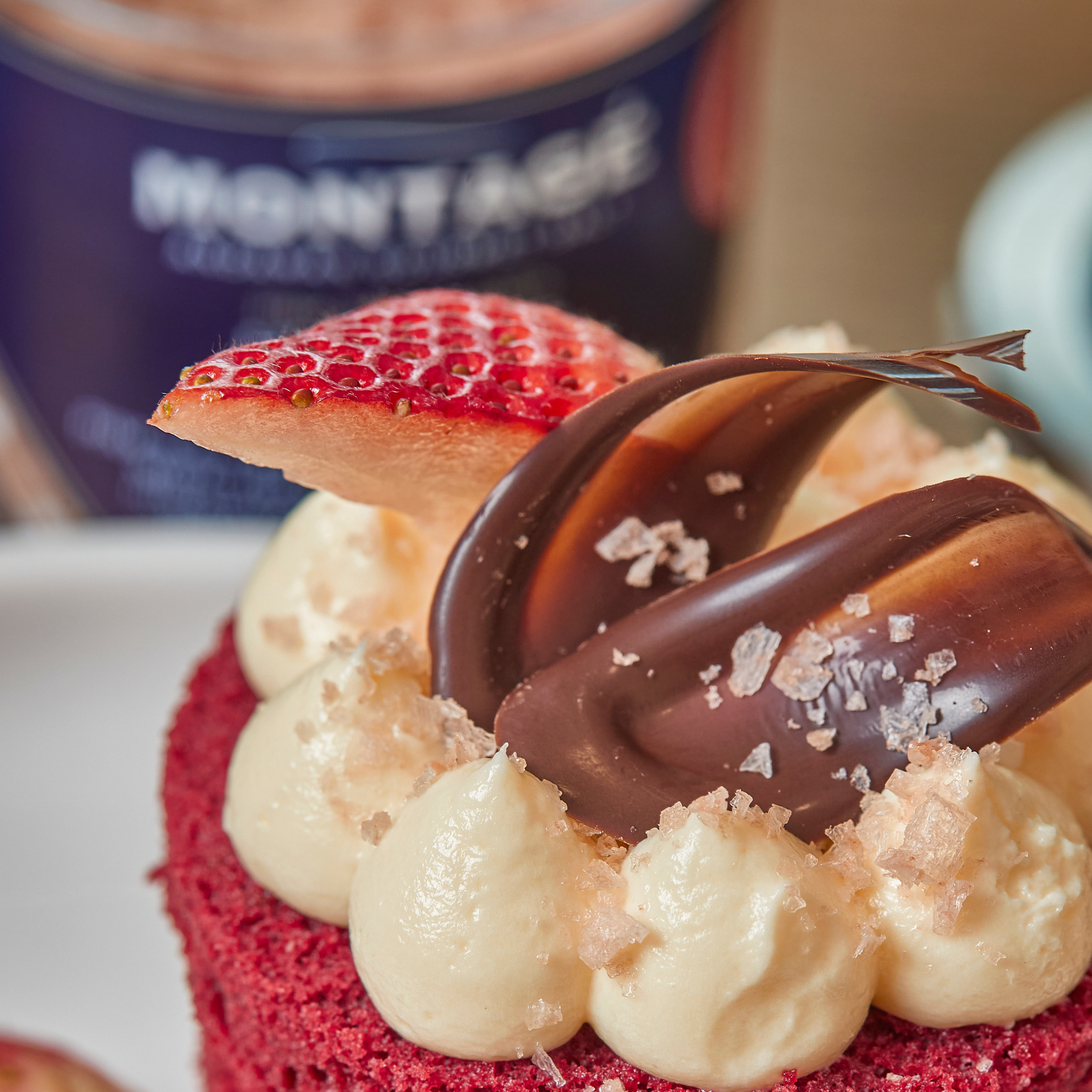 Flaky Pink Himalayan Salt Garnish on Red Velvet Cake