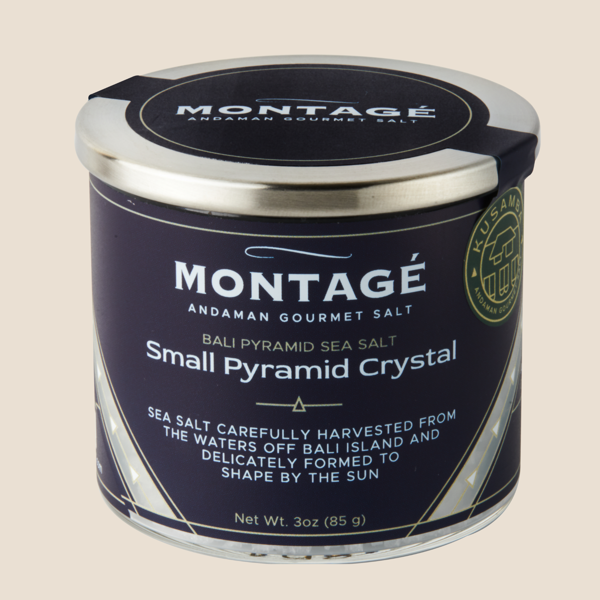 Jar of Montage Andaman Gourmet  Kusamba Salt with a blue label on a beige background