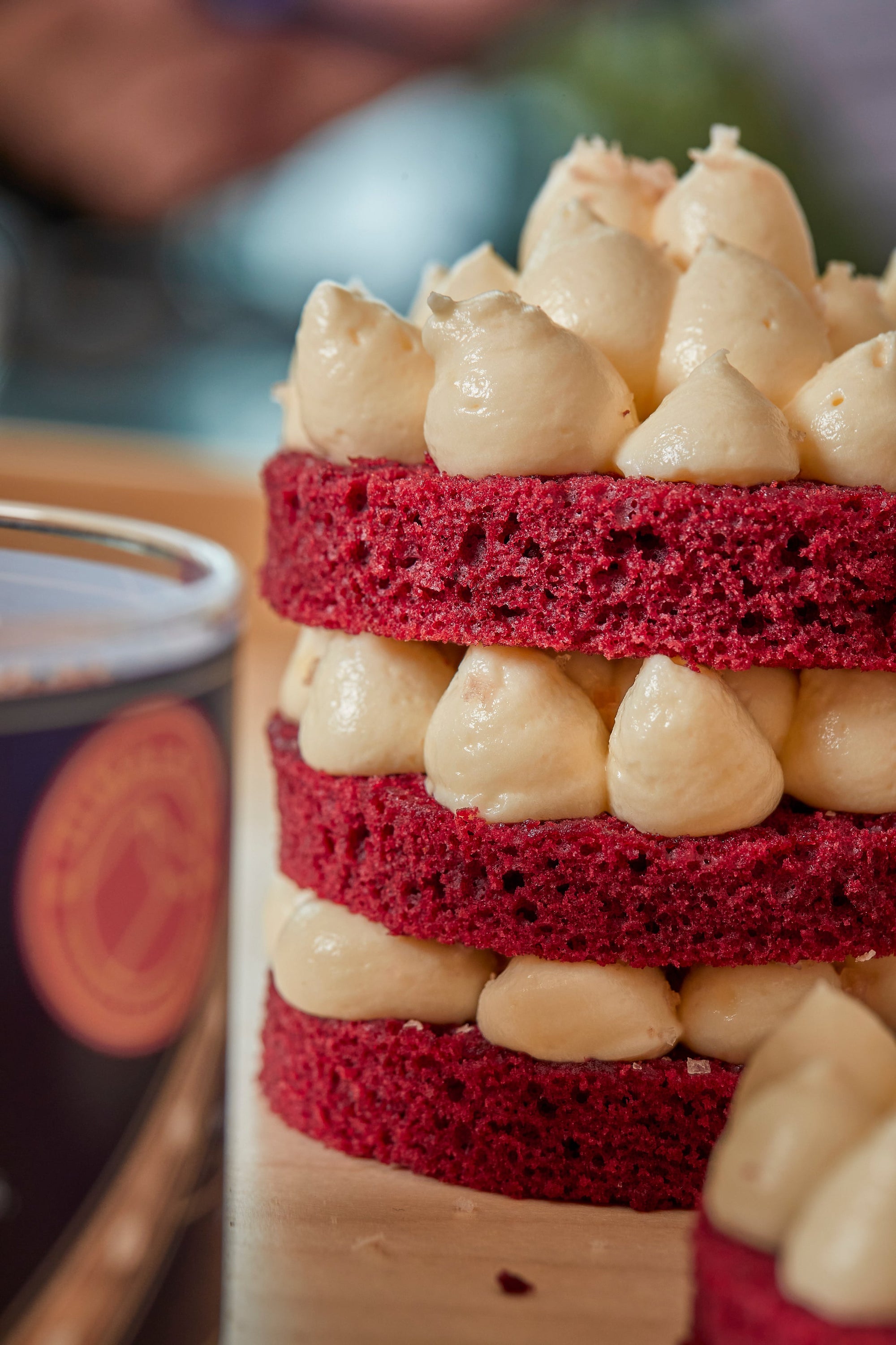 Red velvet cake layers with cream and Himalayan pink salt flakes, a sweet-and-salty dessert pairing