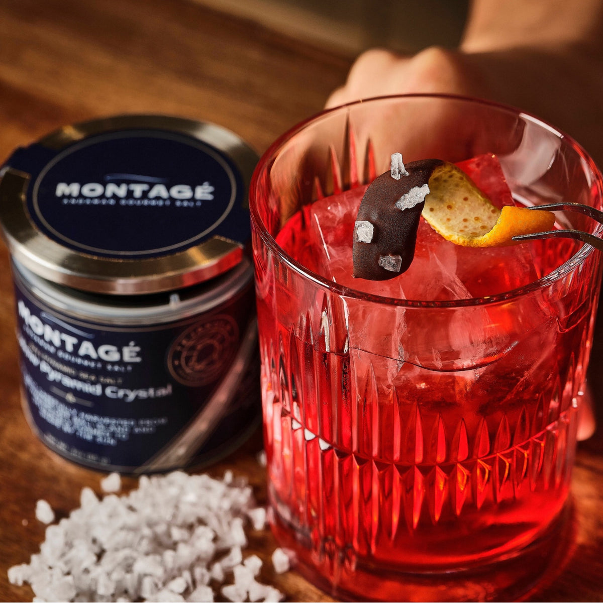 Close-up of a negroni finished with Montagé Tejakula hollow pyramid salt