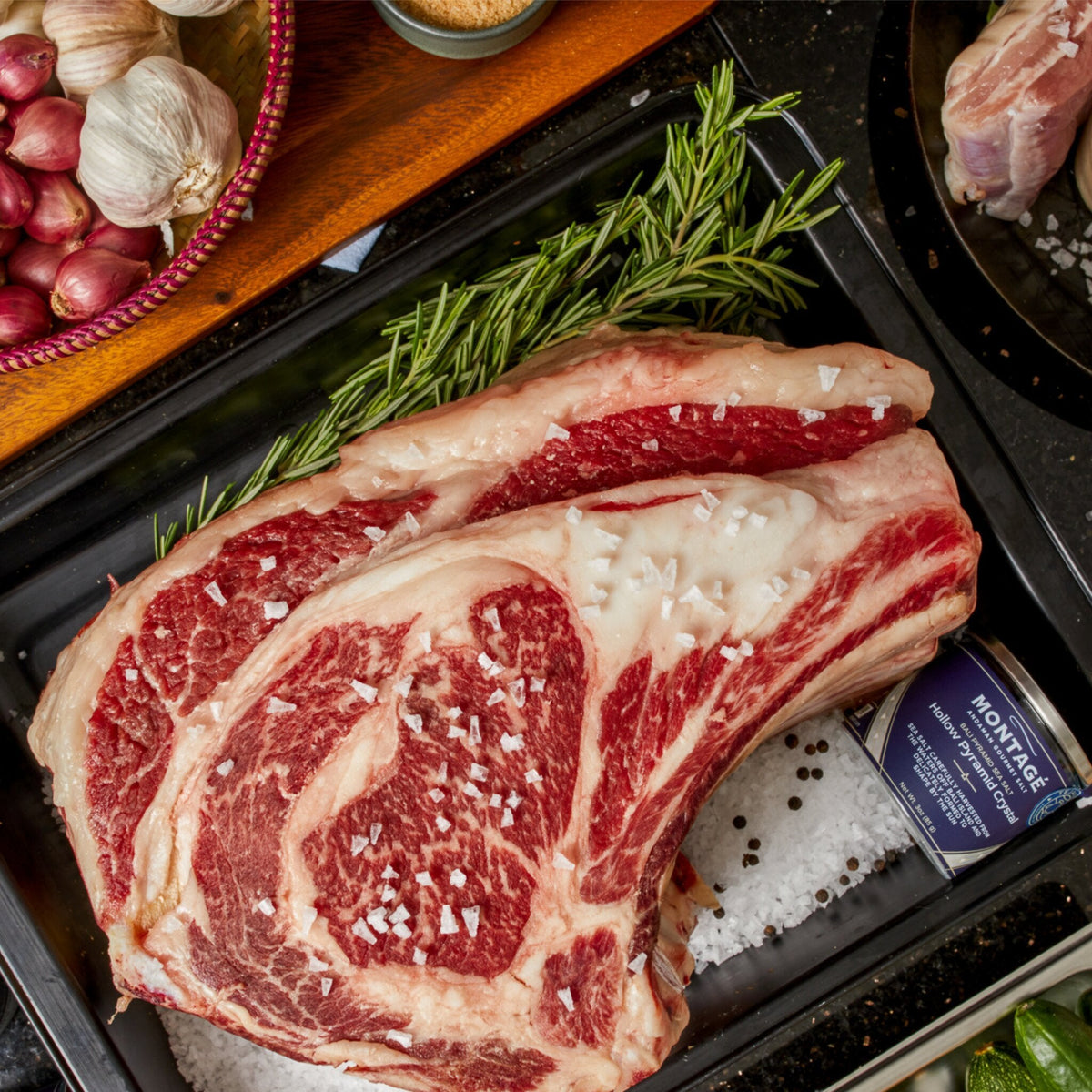 Prime rib roast dry-brined with Montagé Tejakula hollow pyramid salt crystals in a roasting tray
