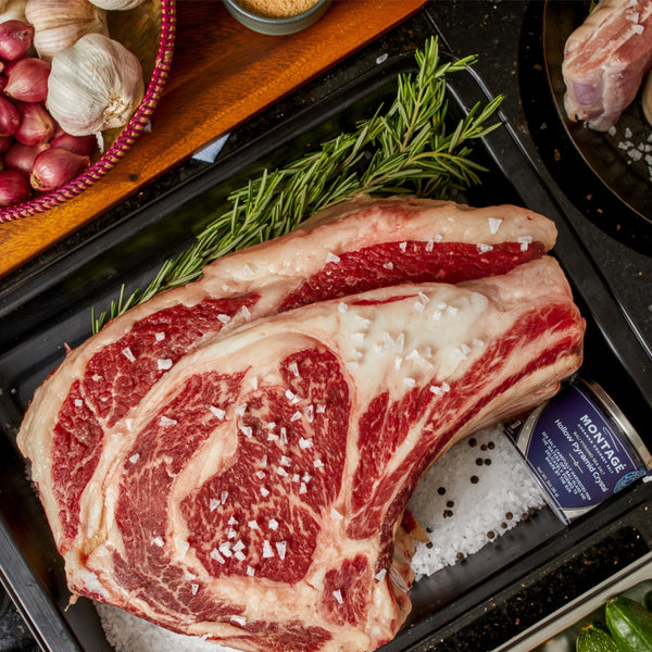 Prime rib roast dry-brined with Montagé Tejakula hollow pyramid salt crystals in a roasting tray
