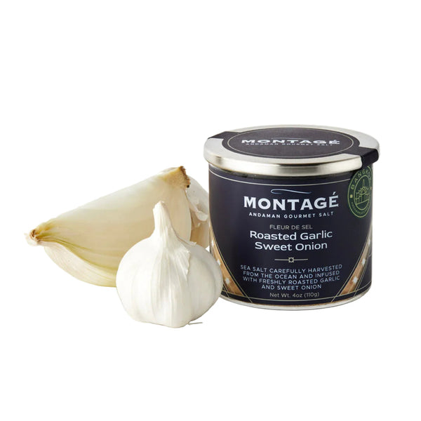 Luxury culinary gift featuring Montage Bangkok's roasted garlic sea salt in designer glass packaging with stainless steel lid.